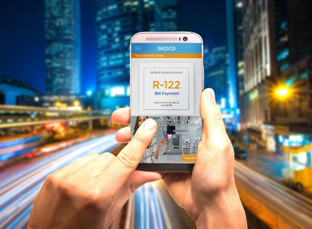 A person using smart phone to get into a virtual queue - SEDCO digital transformation solutions for telecom A person using smart phone to get into a virtual queue - SEDCO digital transformation solutions for telecom
